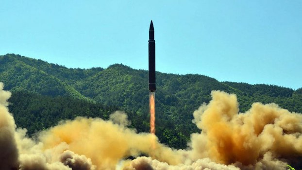 Photo released by North Korea's official Korean Central News Agency (KCNA) shows the launch of intercontinental ballistic missile Hwasong-14 at an undisclosed location, July 4, 2017.