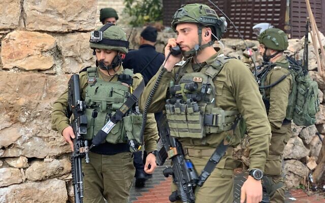 Illustrative: IDF forces on the scene of a stabbing attack near the West Bank settlement of Kiryat Arba on January 18, 2020. (IDF Spokesperson's Office)