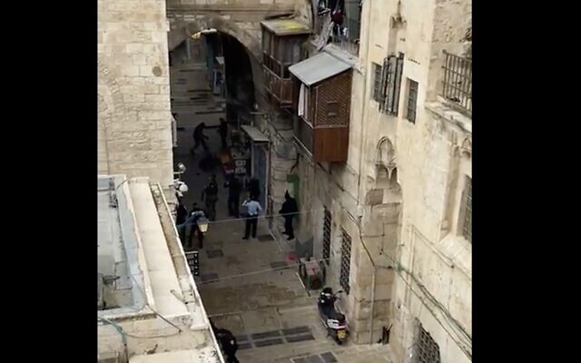 Police at the scene of a suspected shooting attack in Jerusalem's Old City on November 21, 2021. (Screen capture: Twitter)