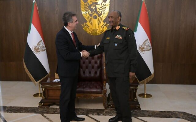 Foreign Minister Eli Cohen (left) meets with Sudanese ruler Gen. Abdel Fattah al-Burhan in Khartoum on February 2, 2023. (Shlomi Amsallem)